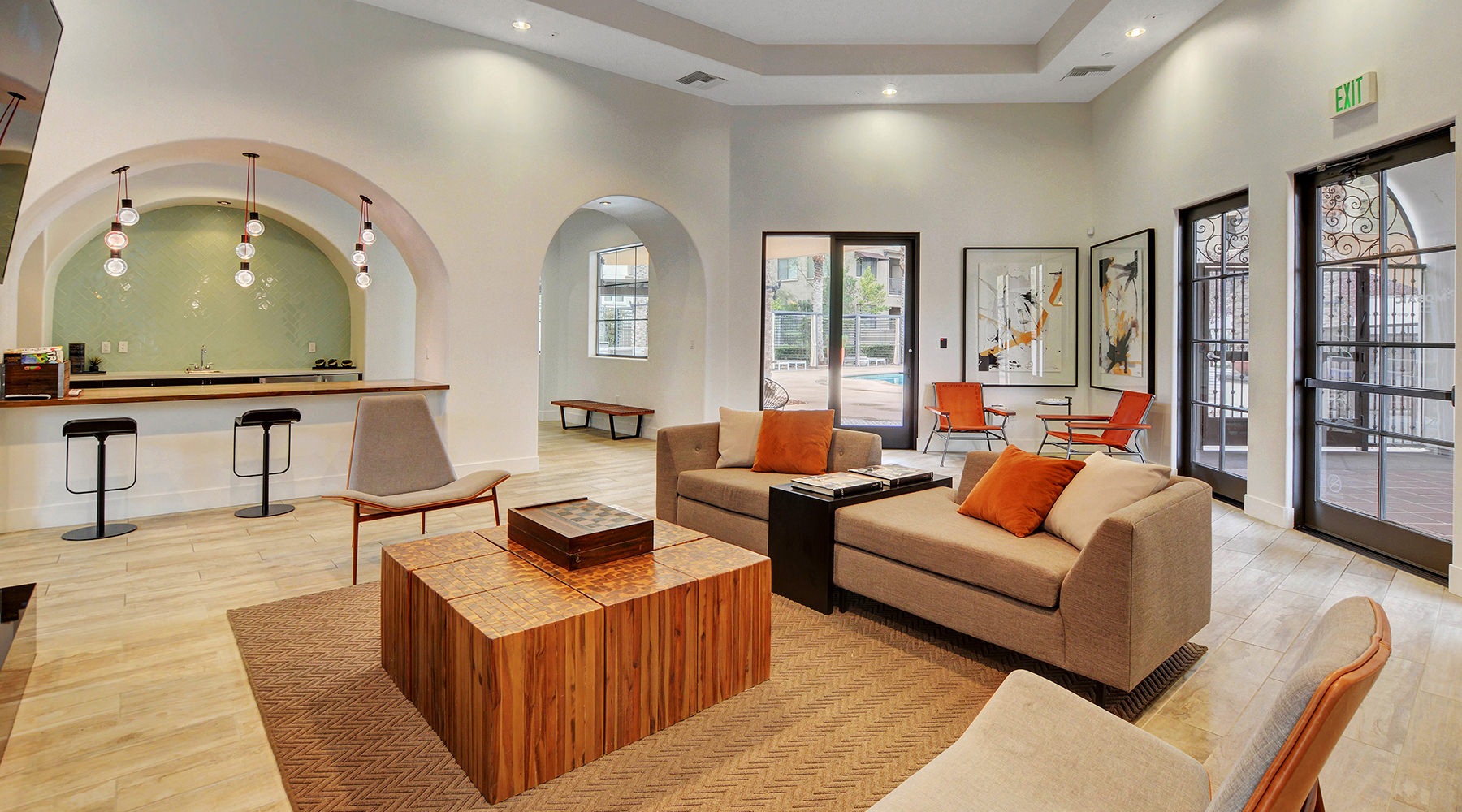 Lounge Spacious and well lit lounge with plenty of seating and a fireplace